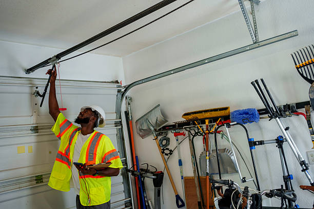 Professional Garage Door Roller Replacement technician working in Covington, IN